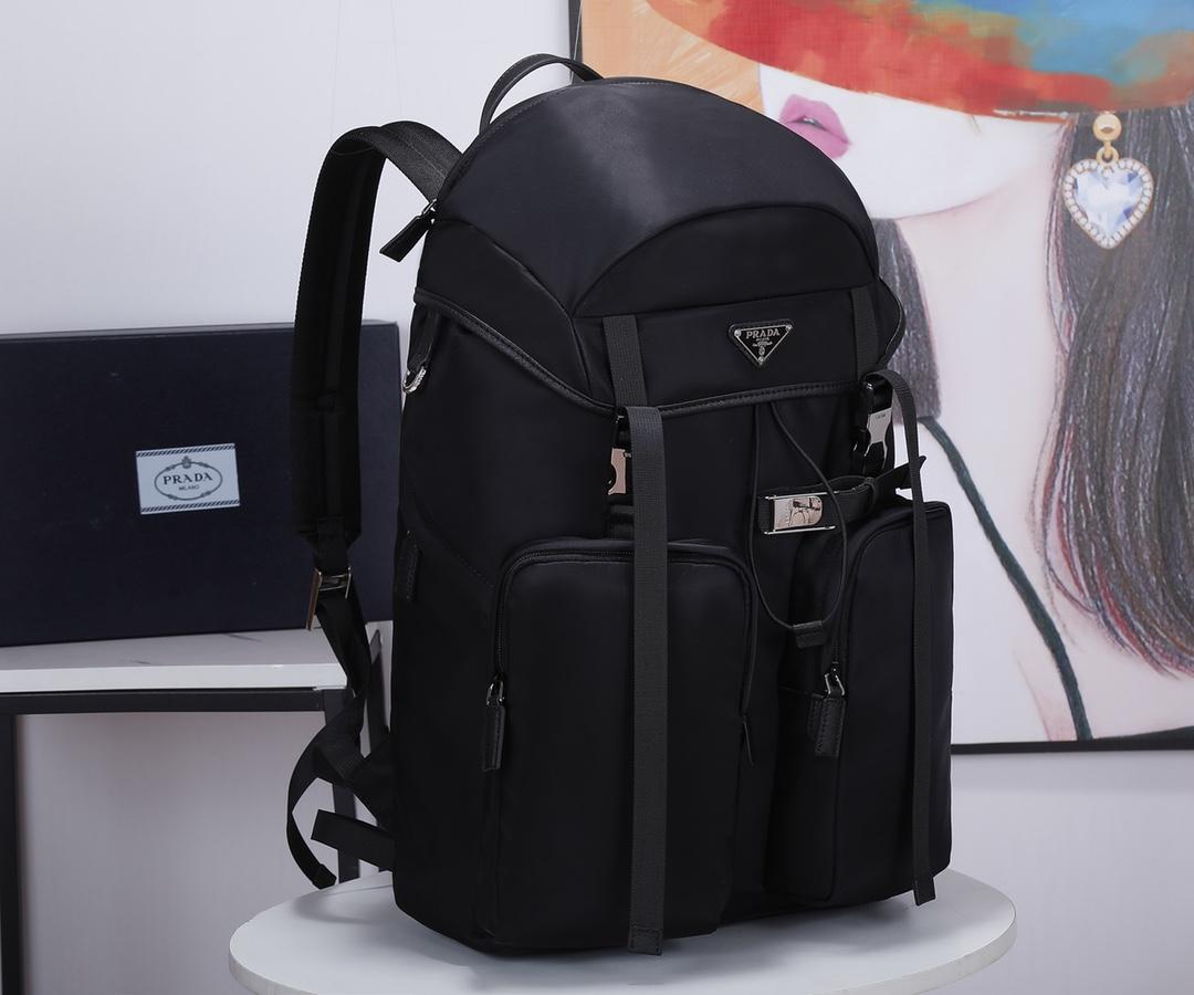 re-nylon-and-saffiano-leather-backpack-2642_16843956193-1000