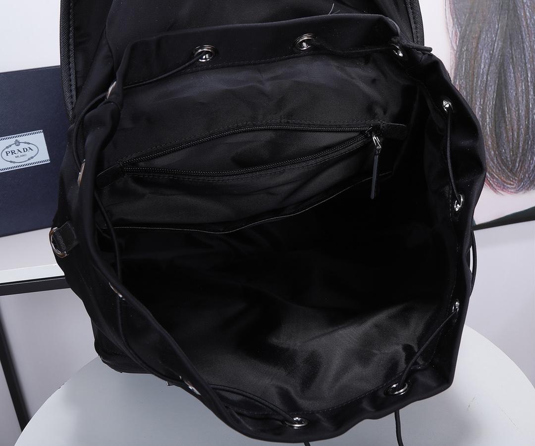 re-nylon-and-saffiano-leather-backpack-2642_16843956208-1000