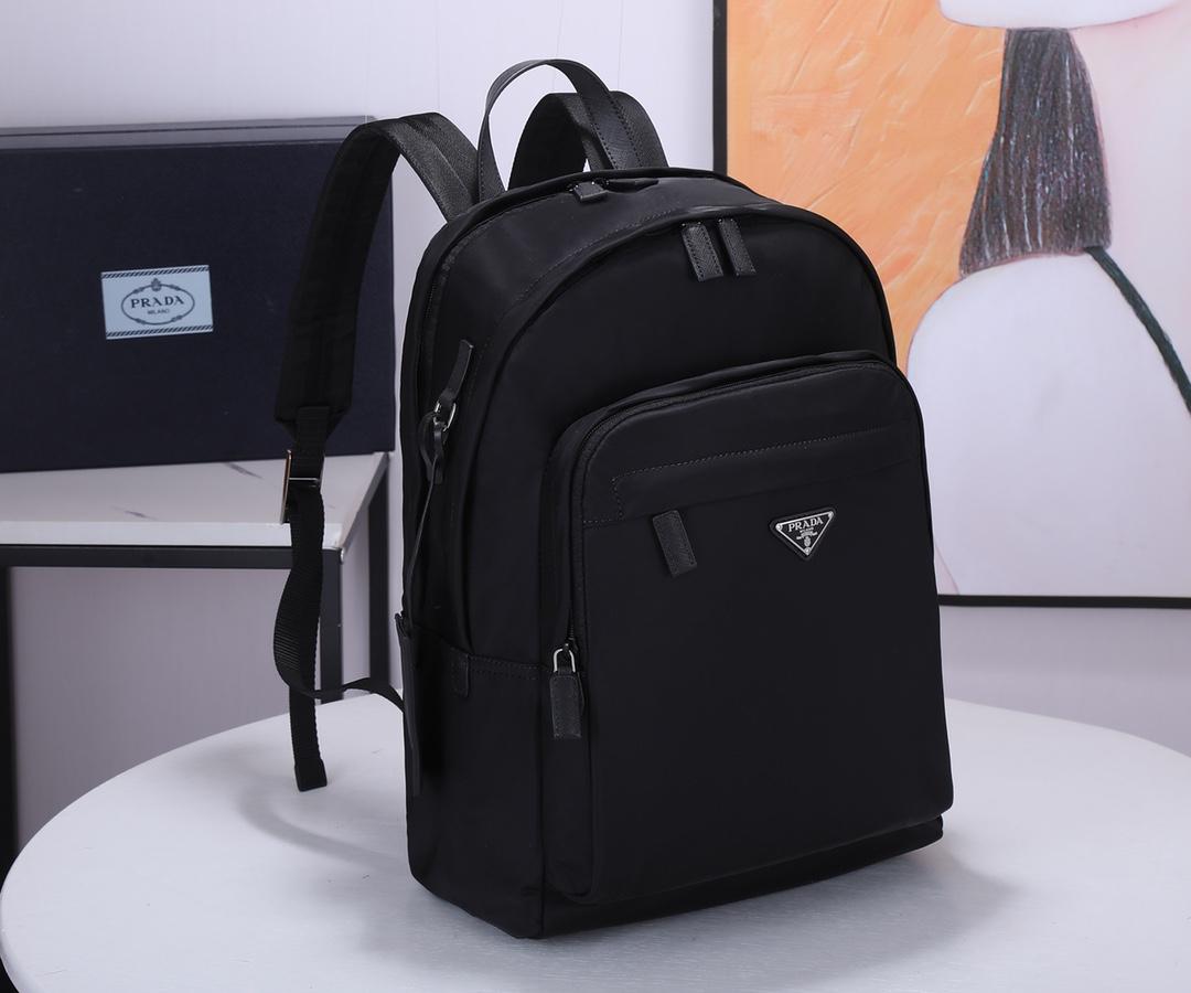 re-nylon-and-saffiano-leather-backpack-2644_16843956223-1000