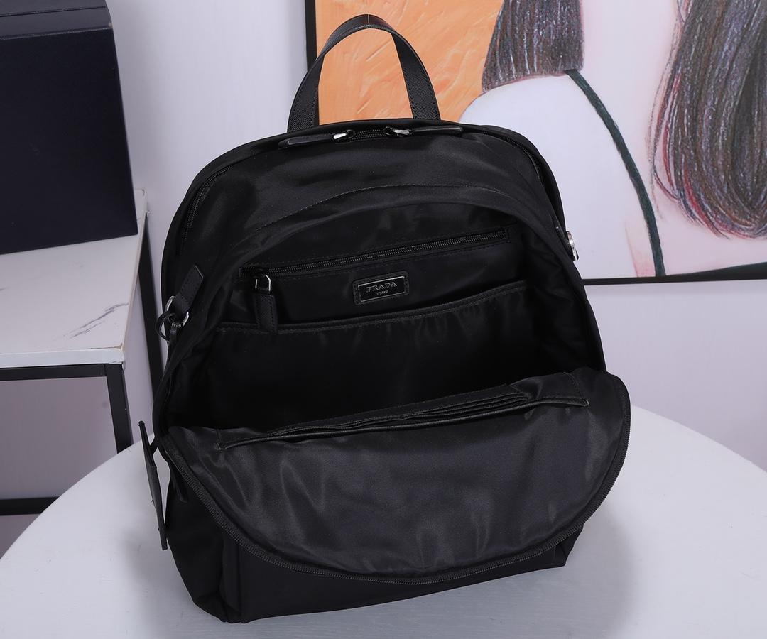 re-nylon-and-saffiano-leather-backpack-2644_16843956227-1000