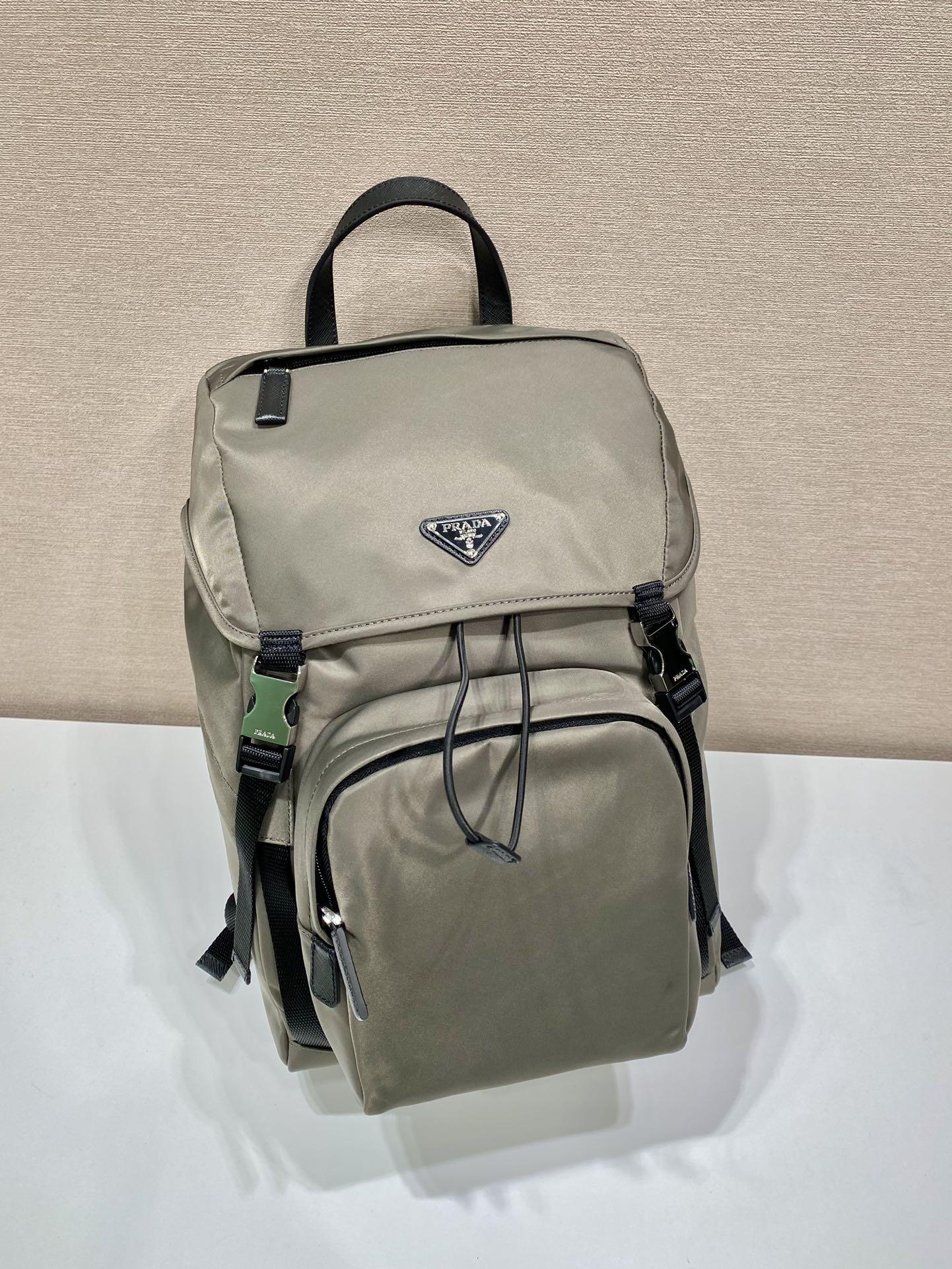 re-nylon-and-saffiano-leather-backpack-2648_16843956293-1000