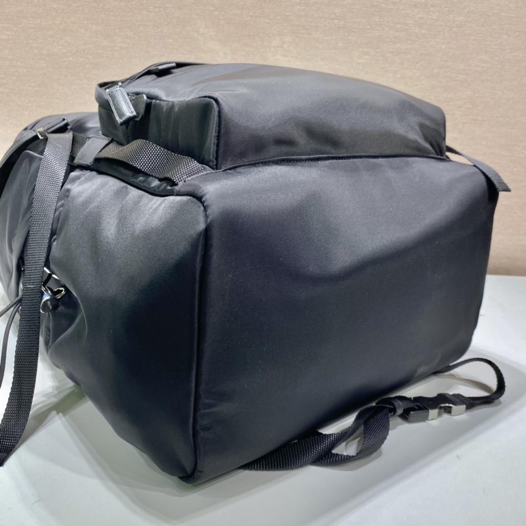 re-nylon-and-saffiano-leather-backpack-2649_16843956324-1000