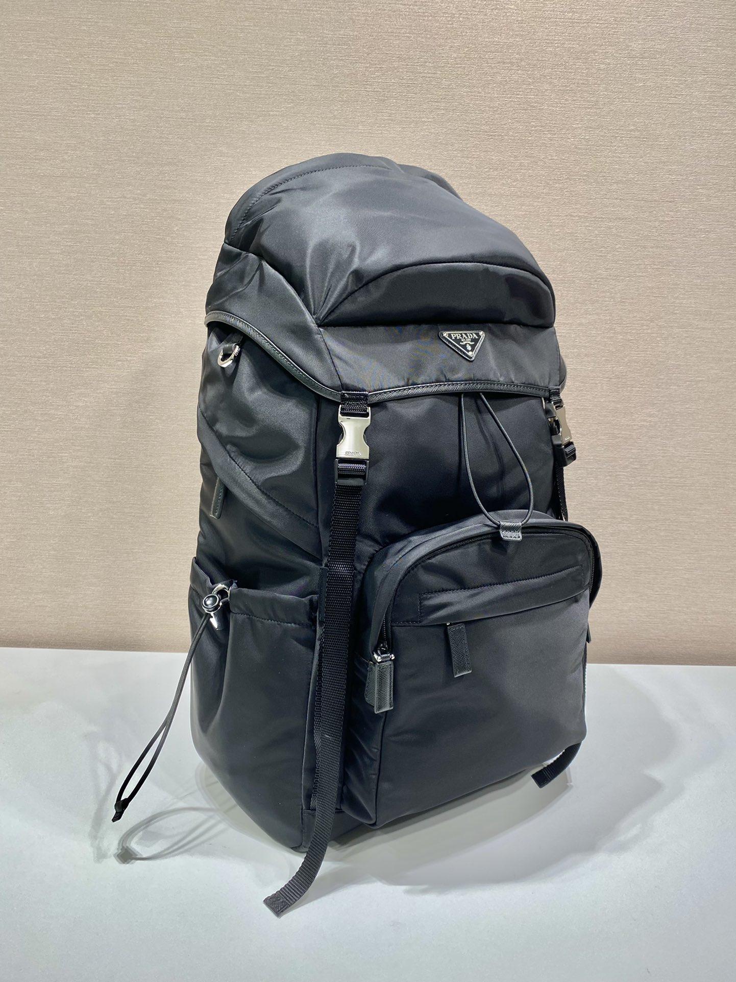 re-nylon-and-saffiano-leather-backpack-2649_16843956325-1000