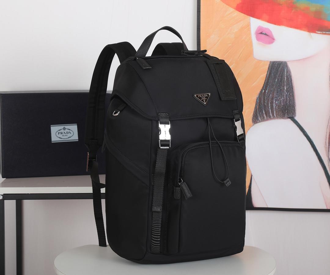 re-nylon-and-saffiano-leather-backpack-with-hood-2643_16843956203-1000