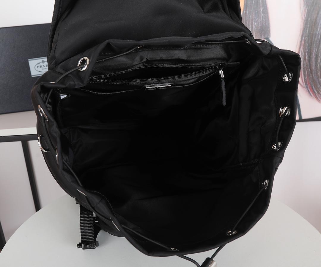 re-nylon-and-saffiano-leather-backpack-with-hood-2643_16843956218-1000