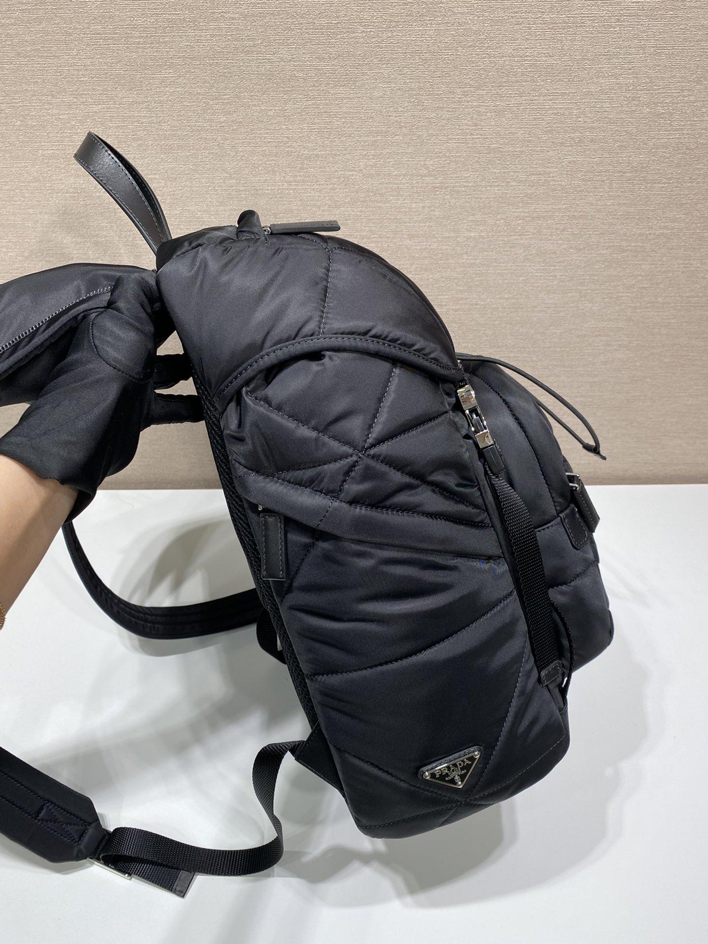 re-nylon-padded-backpack-with-hood-2647_16843956286-1000